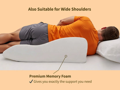 Man with broad shoulders using the Papaya Pillow in a side sleeping position